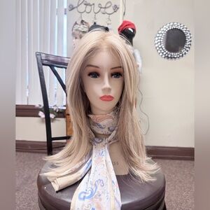 Belle Tress Hand Tied Heat friendly synthetic hand tied wig.